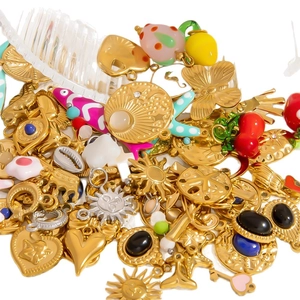 Assorted stainless steel gold enamel charms set with sun, heart, and animal shapes for DIY