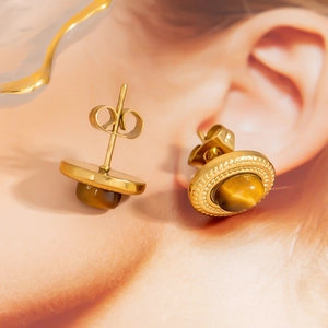Minimalist stainless steel gold stud earrings featuring natural round tiger eye stones