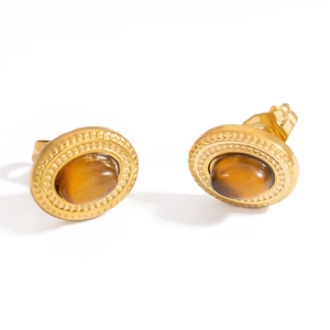 Vintage gold stainless steel stud earrings with oval tiger eye stones on white background