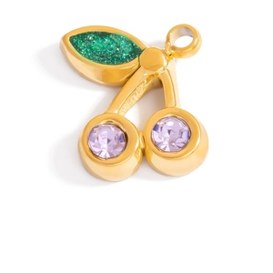 Golden cherry pendant with purple crystal fruits and green glitter leaves on white background