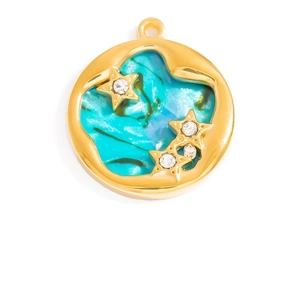Detail of 18K gold star pendant with teal marble enamel and white zircons