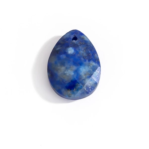 Detailed view of faceted teardrop lapis lazuli pendant with natural gold and white patterns