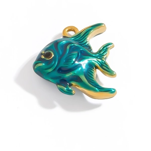 Detail of tropical angelfish pendant with blue-green enamel and golden metal edging