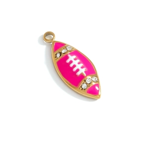 Detail view of pink enamel rugby pendant with gold plating and sparkling rhinestones