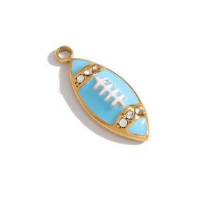 Close-up of light blue enamel rugby pendant with gold plating and cubic zirconia accents