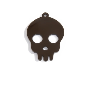 Detailed view of skull-shaped Halloween pendant with high-gloss finish and hanging hole