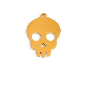 Detail view of a gold-plated stainless steel skull pendant for DIY jewelry and keychains