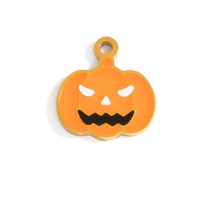 Detailed close-up of a vibrant orange pumpkin charm with a gold-plated metal frame