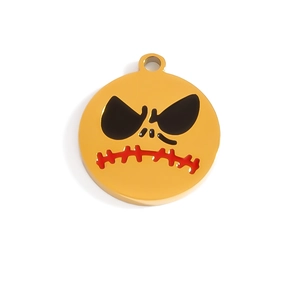 Detail of a round golden Halloween pendant featuring a black and red skull design