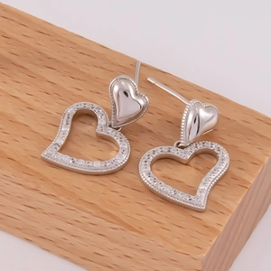 Boucles d'oreilles cœur irrégulières en argent 925 avec finition vintage martelée