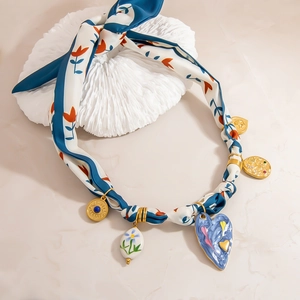 Bohemian silk scarf necklace with blue enamel heart pendant and gold engraved charms