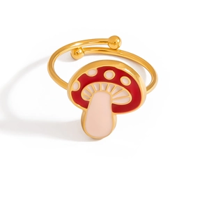 Macro detail of a creative red and pink mushroom ring with a golden adjustable band