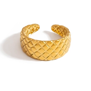 Minimalist gold-plated open ring featuring a quilted rhombic pattern in a polished finish