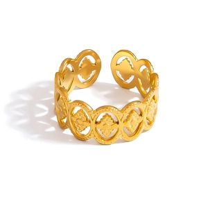 Minimalist stainless steel open ring with gold hollow clover pattern in retro style