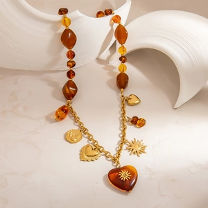 Vintage 18K gold stainless steel necklace with amber resin beads and heart pendants