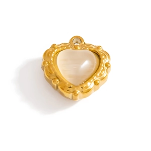 Baroque gold heart pendant with cream resin inlay and ornate floral relief carvings