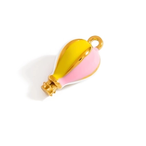 Detail of hot air balloon pendant with pink yellow enamel and golden hollow metal carving
