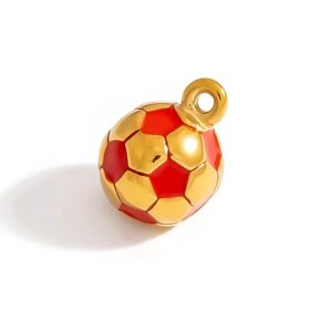 Macro view of a gold-plated soccer charm with red enamel details for DIY jewelry making
