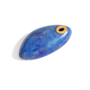 Detailed macro view of an oval blue faux lapis lazuli resin pendant with gold metal ring