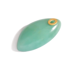 Detail of marquise-shaped turquoise stone pendant with polished finish and gold bail