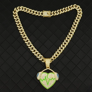 Hip hop cuban link chain with golden iced out heart headphone and green pulse line pendant