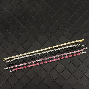 Cross star tennis bracelets in gold, silver, black and pink with full diamond inlay