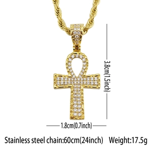 Detailed view of gold plated Ankh cross pendant with micro-paved cubic zirconia stones