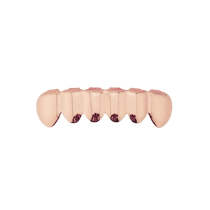Macro shot of rose gold plated six-tooth top grillz with mirror polish finish for hip hop