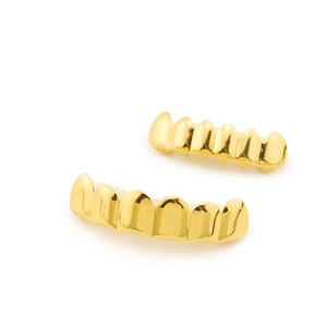 Polished gold teeth grillz set with upper and lower pieces for hip hop fashion style