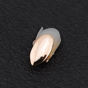 Polished rose gold single tooth grillz with silicone fixing bar for hip hop costume