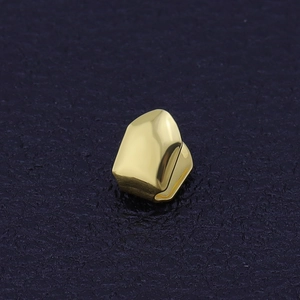 Single tooth gold plated hip hop grillz accessory with polished mirror finish surface