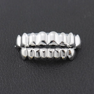 Polished silver hip hop grillz set for top and bottom teeth with glossy mirror finish