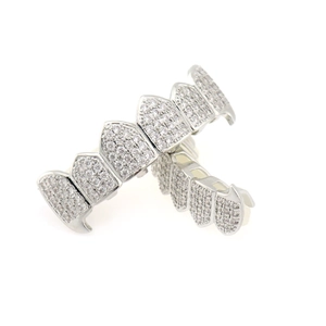 Silver plated hip hop grillz set with micro paved cubic zirconia stones on white background