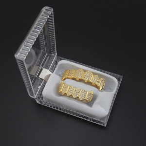 Hip hop gold plated grillz set with sparkling white zircon stones in a clear display box