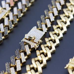 Macro shot of 15mm Miami Cuban link necklace with iced out black and white rhinestones