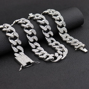 Men's 20mm wide silver iced out cuban link chain necklace with full diamonds in hip hop style