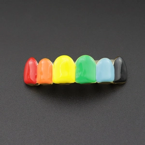 Macro detail of six-tooth rainbow enamel hip hop grillz with gold-plated finish