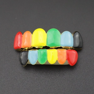 Close-up of rainbow enamel hip hop grillz with gold plating and silicone molding bars