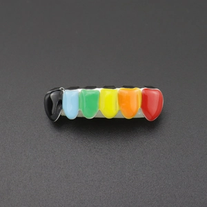 Detail view of hip-hop tooth grillz with six-color enamel glaze and gold plating finish