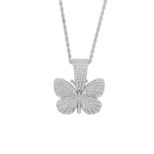 Macro shot of the iced-out butterfly pendant with sparkling rhinestones and rope chain