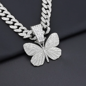 Iced out silver butterfly pendant cuban link necklace with shimmering crystal stones