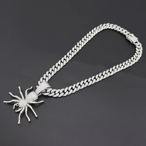 Iced-out spider pendant necklace with crystal encrusted thick Cuban link chain for men