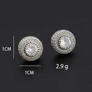 Macro detail of 1cm round hip hop stud earrings with cubic zirconia and micro pave