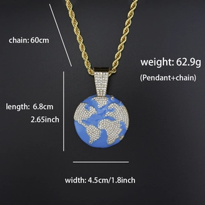 Detailed close-up of a gold rope chain and iced-out world map pendant with blue enamel