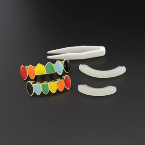 Rainbow enamel teeth grills set with gold plating, including silicone bars and tweezers