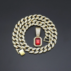 Hip hop style gold Cuban chain with sparkling rhinestones and red ruby pendant