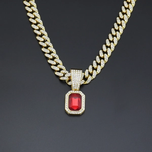 Iced out cuban chain necklace with emerald cut red ruby pendant in hip hop style
