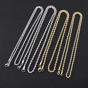 Detailed macro view of 3mm gold and silver stainless steel rope chains with lobster clasps