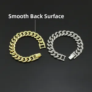 Macro detail of the smooth polished back surface on golden and silver Cuban link chains