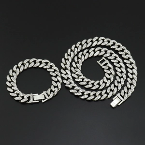 Silver iced out Cuban link chain necklace and bracelet set with sparkling rhinestones